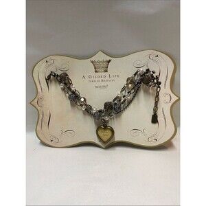 A Gilded Life Layered Mixed-Metal Heart Charm Bracelet in Gold and Silver NoC